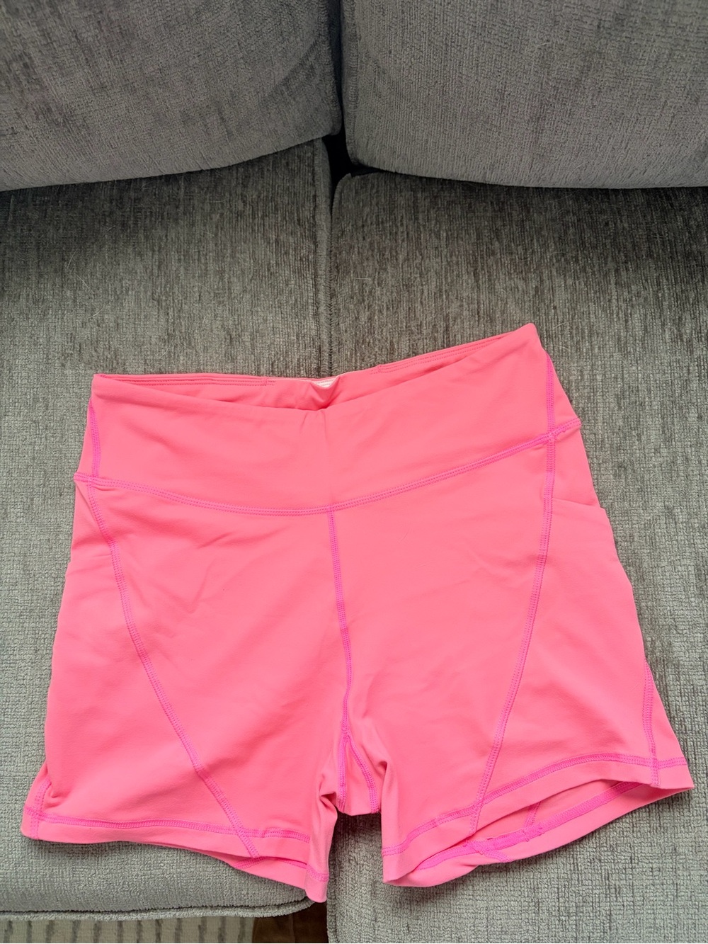 Pink athletic Born Primitive shorts with pockets. Large